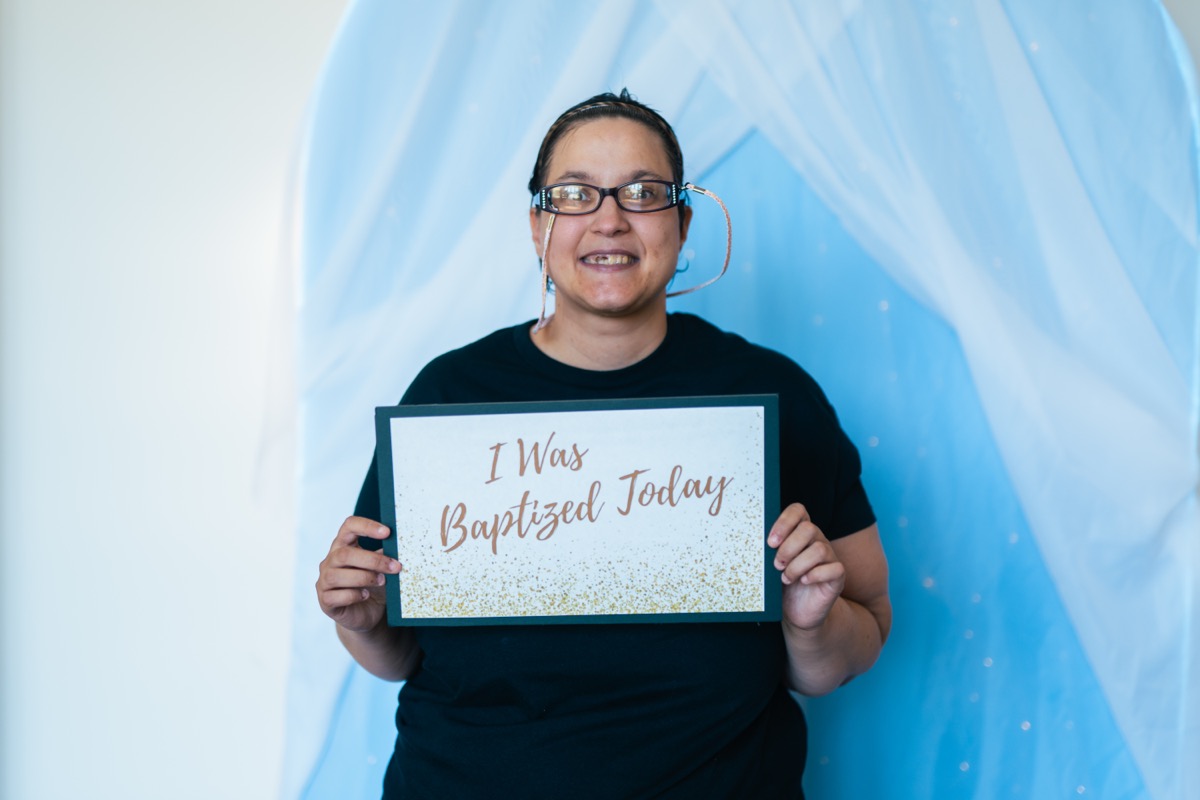 A Crossroads member celebrating their baptism