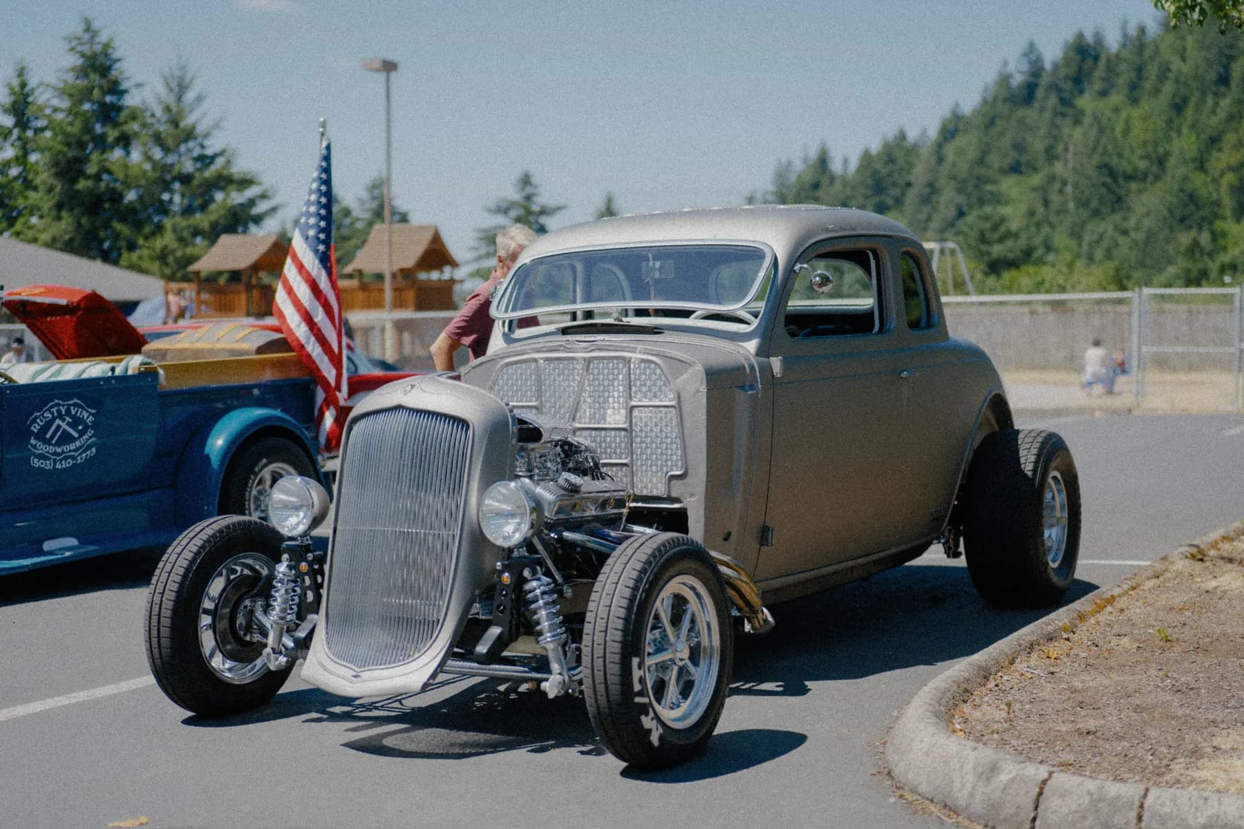 Classic car parked at Hot Rods and Dad Bods 2026, photo 4.