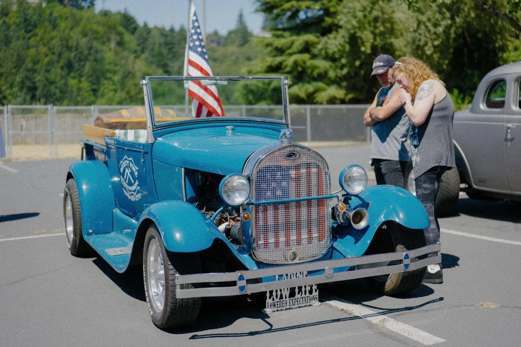 Classic car parked at Hot Rods and Dad Bods 2026, photo 8.