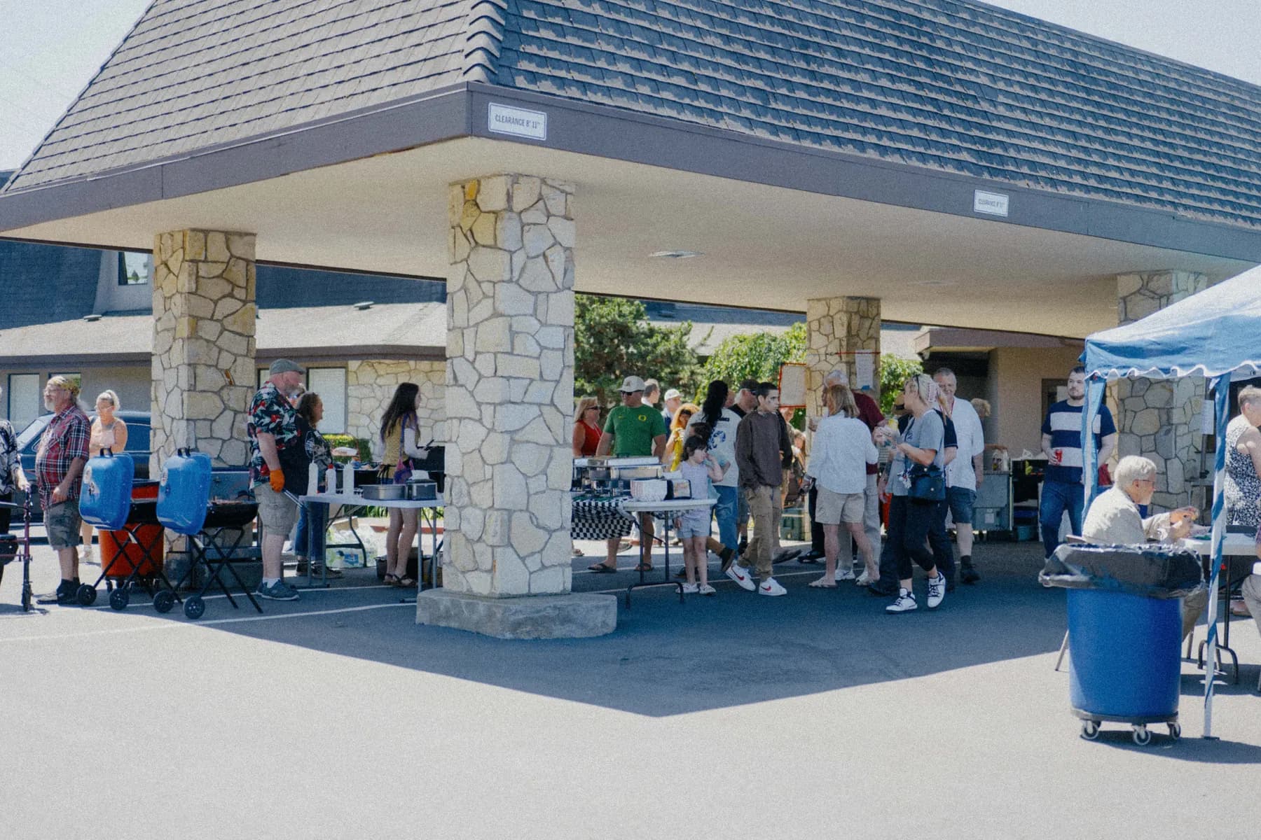 Guests gathering around the Hot Rods and Dad Bods 2026 event area, photo 23.