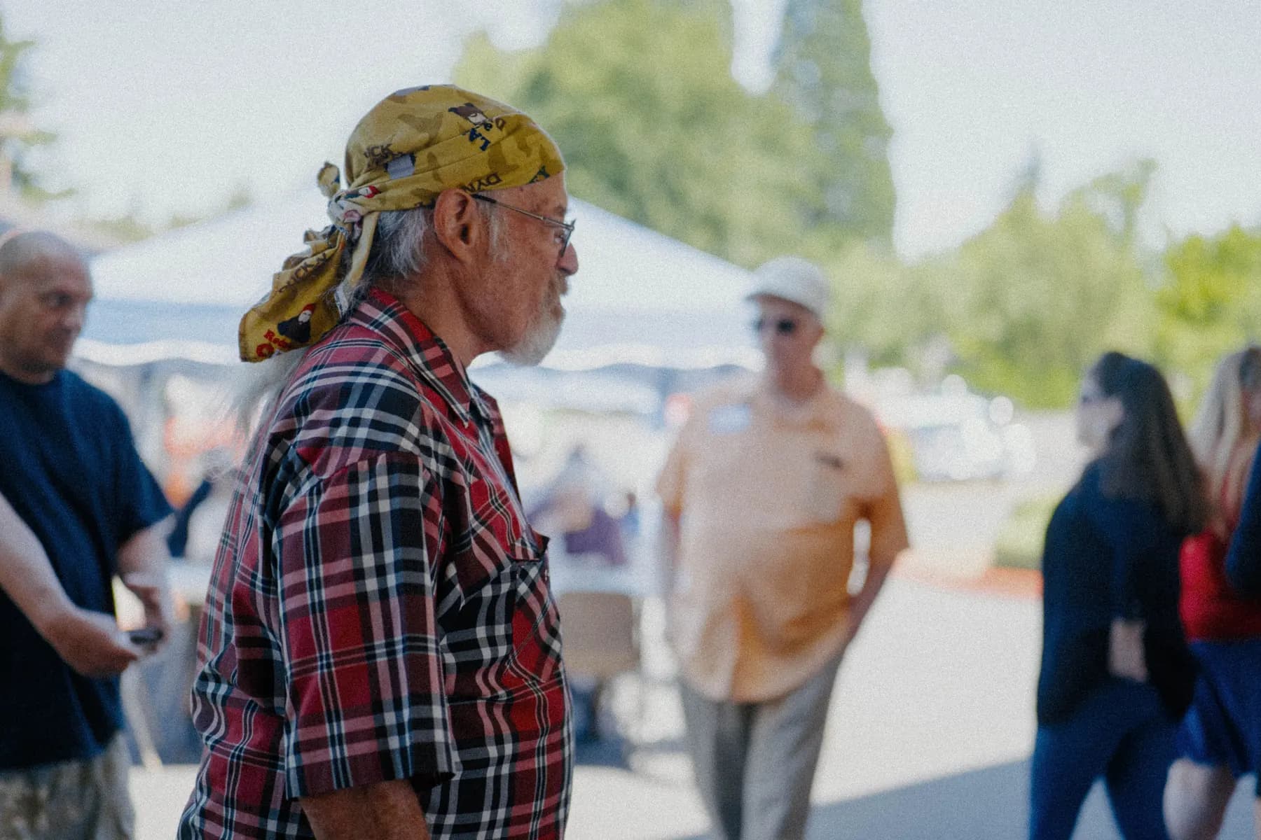 Guests gathering around the Hot Rods and Dad Bods 2026 event area, photo 25.