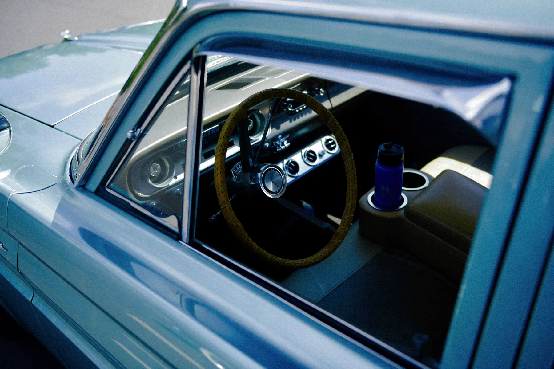 Alec Autry close-up detail from a classic car at Hot Rods and Dad Bods 2026, photo 11.