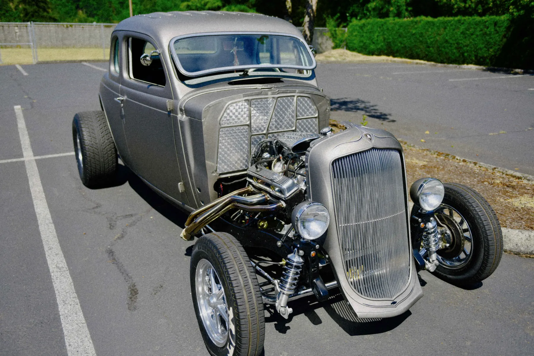 Alec Autry close-up detail from a classic car at Hot Rods and Dad Bods 2026, photo 18.