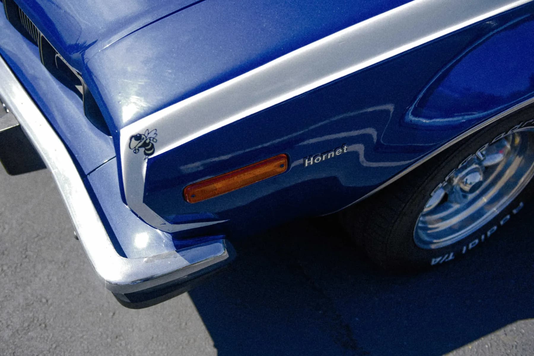 Alec Autry close-up detail from a classic car at Hot Rods and Dad Bods 2026, photo 30.
